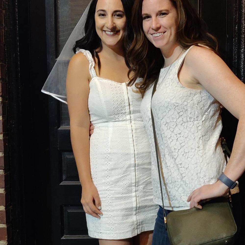 White lace cotton mini dress.